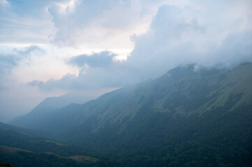 Naklejka premium clouds over the mountains