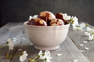 Brown Easter eggs in a bowl indoors