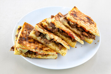 Turkish karisik atom Ayvalik tost ( kasarli bazlama tost) . Sucuklu, Kasarli, kavurmali karisik...