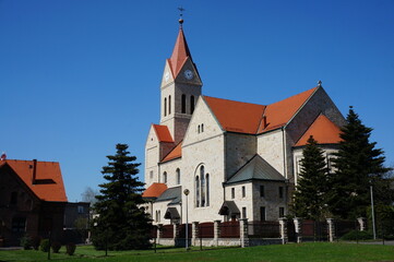 Fototapeta na wymiar Neo-Romanesque Church of the Visitation of the Blessed Virgin Mary (kosciol Nawiedzenia Najswietszej Maryi Panny). Orzesze, Poland.