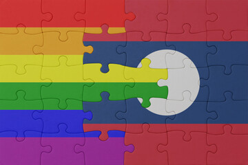 puzzle with the flag of rainbow gay pride and laos . macro.concept.