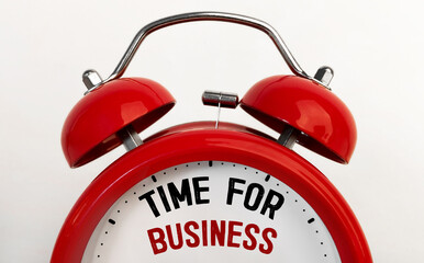 Red alarm clock with text TIME FOR BUSINESS