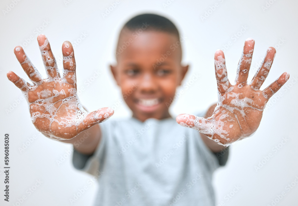 Sticker Keep your hands happy and healthy. a little boy showing his hands after washing them at home.