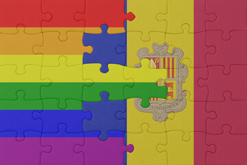 puzzle with the flag of rainbow gay pride and andorra . macro.concept.