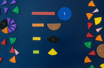 Math fractions on blue background. Interesting math for kids. Education, back to school concept....