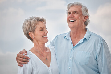 A life filled with laughter is a life well lived. a mature couple enjoying a romantic day along the coast.