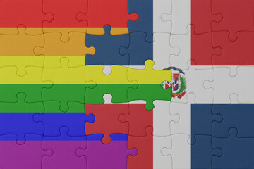 puzzle with the flag of rainbow gay pride and dominican republic . macro.concept.