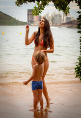 mother and child on the beach
