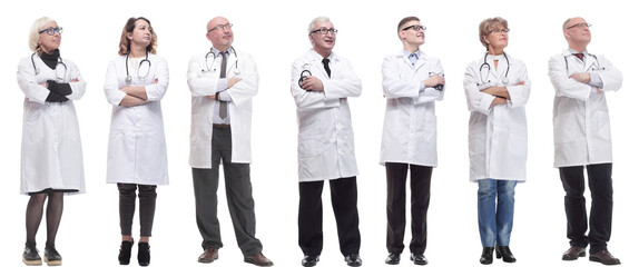 group of doctors standing in full length isolated on white