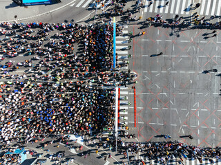 23rd of April 2023, Belgrade, Serbia. Shot of a group of young men running a marathon. Aerial drone...