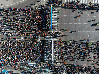23rd of April 2023, Belgrade, Serbia Aerial drone photo view of people running a marathon in the city. From above.