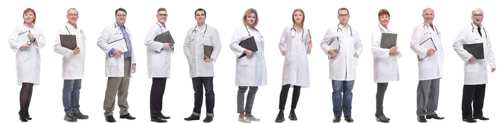 Fototapeta premium full length group of doctors with notepad isolated