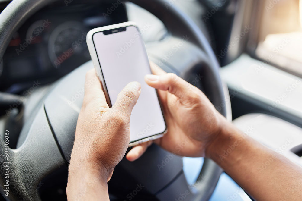 Poster Tracking the fastest and quickest route for his deliveries. Closeup shot of an unrecognisable delivery man using a cellphone while driving in a car.