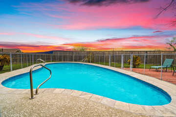 Fototapeta na wymiar swimming pool at sunset