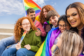 Happy group of gay people having fun celebrating together LGBT pride festival day. LGBTQ community concept