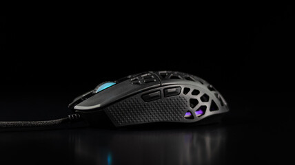 computer gaming mouse on black background