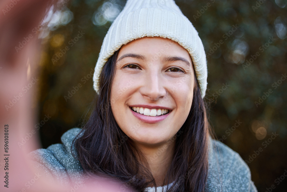 Canvas Prints I cant go outdoors without taking a selfie. an attractive young woman standing alone outside and taking a selfie.