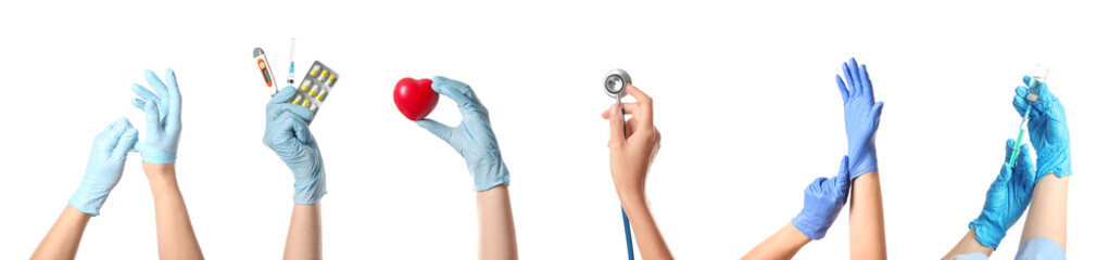 Hands of doctors in sterile gloves and with different items on white background