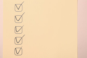 Checklist box with black marks, closeup