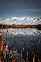 Snowy Mountain Range Reflection over a lake