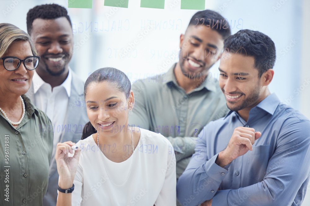 Canvas Prints Shes always got the best ideas. a group of businesspeople brainstorming idea in an office at work.