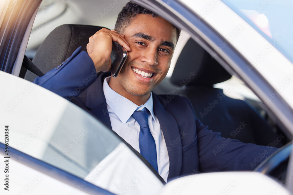 Poster the master of multitasking. cropped portrait of a handsome young businessman making a phonecall whil