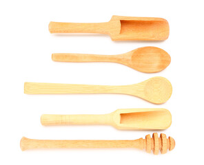 Set of wooden kitchen utensils isolated on white background