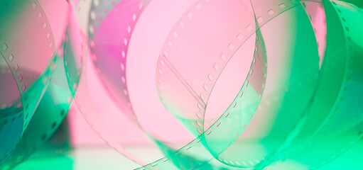 multicolored background with film strip. cinematography film production film industry film festival concept