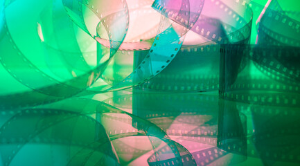 multicolored background with film strip. cinematography film production film industry film festival concept