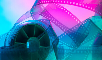 multicolored background with film strip. cinematography film production film industry film festival...