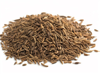 A pile of cumin seeds sits on a white surface.