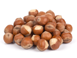Obraz premium A pile of hazelnuts on a white background