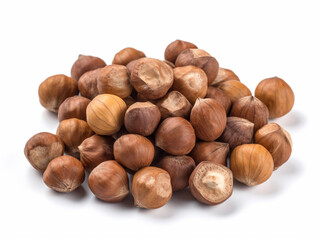 A pile of hazelnuts on a white background
