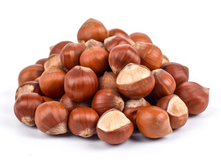A pile of hazelnuts on a white background