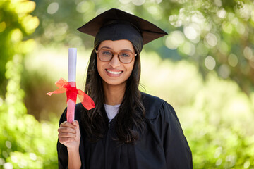 Diligence and dedication always pay off. Cropped portrait of an attractive young female graduate...