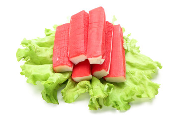Tasty crab sticks with lettuce isolated on white background © Pixel-Shot