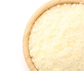 Bowl with tasty grated Parmesan cheese on white background, closeup