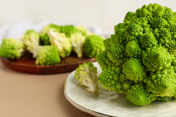Plate with romanesco cabbage on beige table