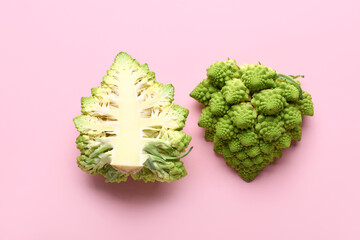 Cut romanesco cabbage on pink background