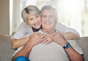 Grandparents are truly irreplaceable. a mature couple sitting on the couch at home.