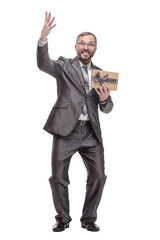 happy business man with a gift box. isolated on a white background.