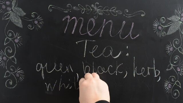 Tea menu. We write the menu on a board.