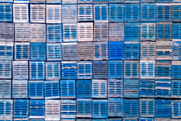 A blue pallet stacked on top of each other