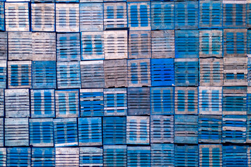 A blue pallet stacked on top of each other
