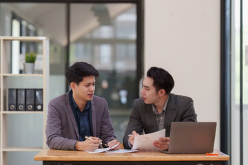 Fund managers team consultation and discuss about analysis Investment stock market. analysis, research finance