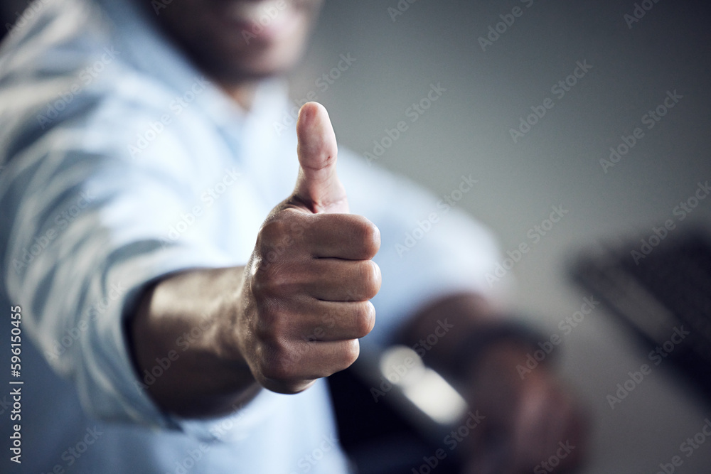 Poster I got my degree in IT. an unrecognisable man showing thumbs up and using a computer at college.