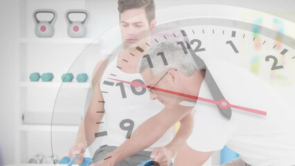 Animation of clock ticking over caucasian male physiotherapist with patient - Powered by Adobe