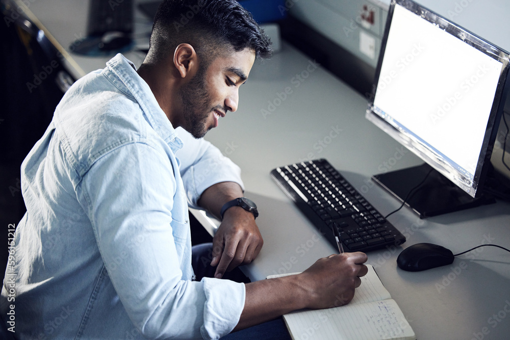 Aufkleber An IT whiz in the making. a young man writing in a notebook and using a computer at college.