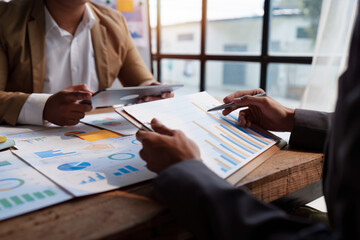 Fund managers team consultation and discuss about analysis Investment stock market. analysis, research finance
