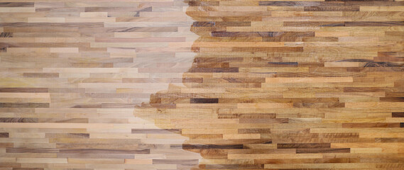 Polished wooden texture of brown flooring in bedroom